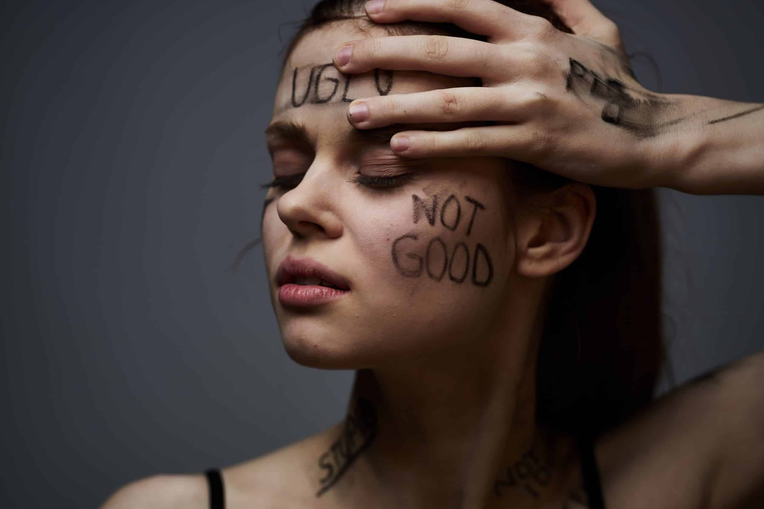 Emotional woman lettering on body communication gesture with hands black background